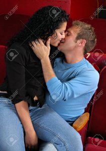 couple-kissing-at-the-movies